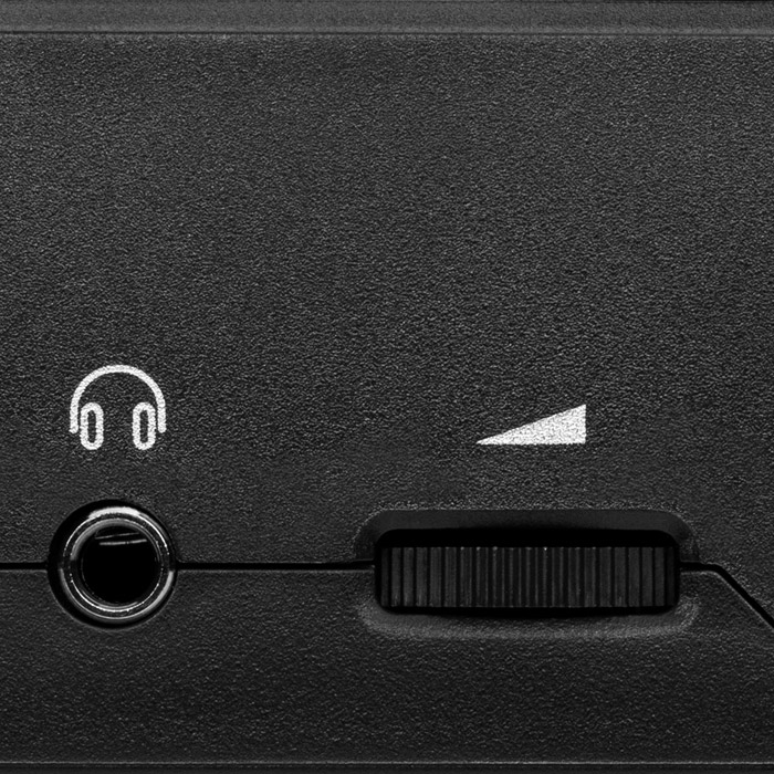 Close up of headphone input and volume control